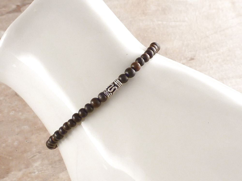 Armband mit Holzperlen und 925 Silber Bali Perle